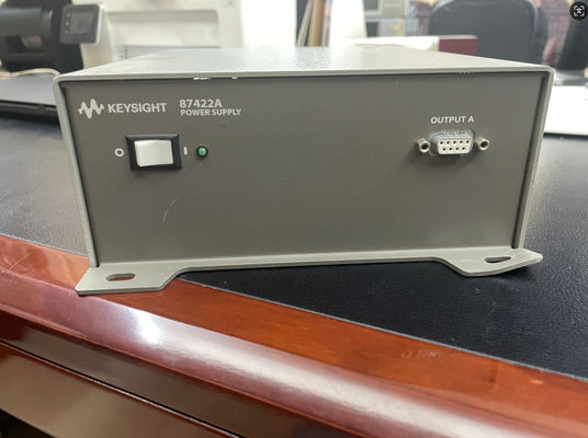 Agilent 87422A Fornitore di corrente di seconda mano 12VDC 15VDC 70W con 83017A 0275 e corrente in modalità normale 4 mArms